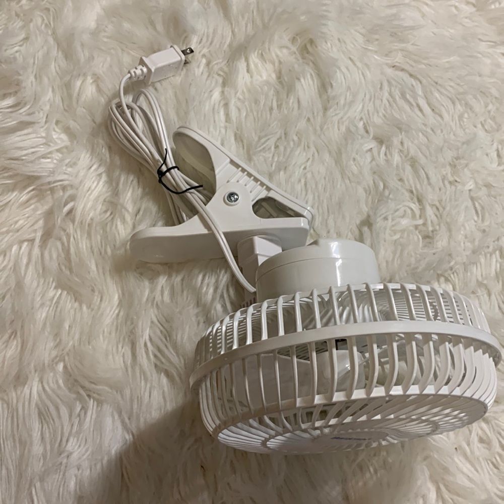 Bedside clip on adjustable two speed fan.  NWOT
